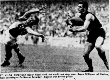 1963 Rd 2 - Bruce Williams marks the footy.