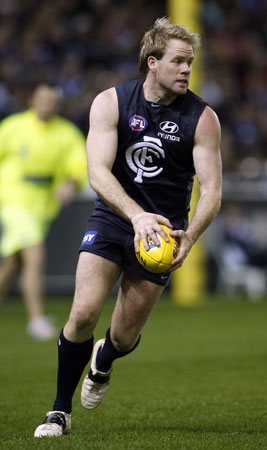 Nick Stevens looking to pass in the Round 20, 2008 game against North Melbourne.