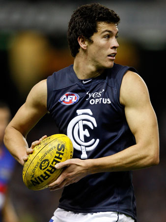 Mark Austin has the ball in the Round 17 win over the 2nd-placed Western Bulldogs.