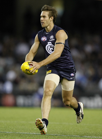 Chris Johnson running the ball inside 50 during the 2009 NAB Cup.