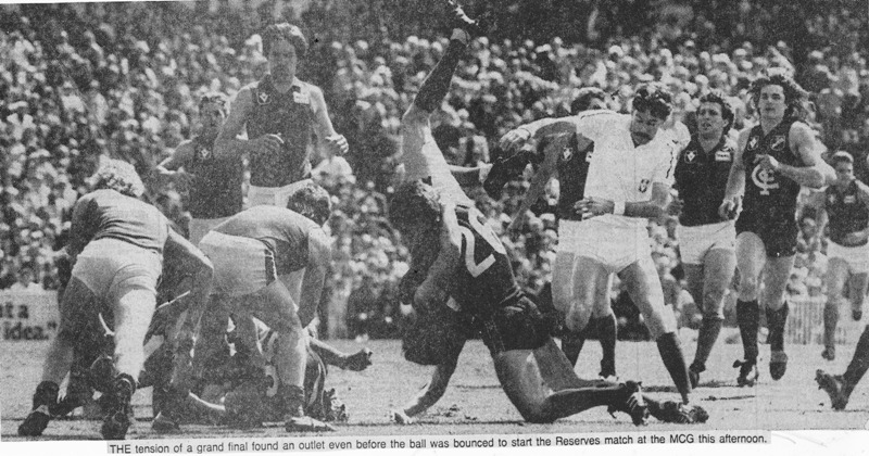 1984 Reserves GF - Mike Smith dumps an opponent as Alvin runs in.