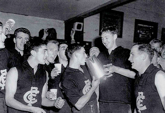 Players left to right: Denis Strauch, Wes Lofts, Chris Pavlou, Barry Bryant, John Chick, Leo Brereton, Maurie Sankey and Bruce Comben. 
Image courtesy of Carlton Football Club.