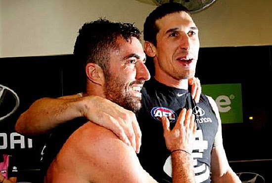 Kade Simpson (250 games) and Michael Jamison (150 games) after Carlton's 2-point victory over Port Adelaide in round 8, 2016. Image courtesy of AFL Media.